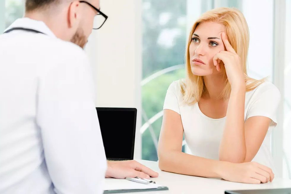 woman in a consultation with a doctor